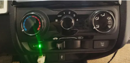 Set the air conditioning temperature to the lowest